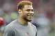 Injured Arizona Cardinals free safety Tyrann Mathieu watches warm ups prior to an NFL football game against the Seattle Seahawks, Sunday, Jan. 3, 2016, in Glendale, Ariz. (AP Photo/Rick Scuteri)