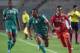 Morocco's forward Brahim Nakach (C) vies for the ball with Tunisian forward Hamza Lahmar (R) during an African Nations Championship (CHAN) qualifying match on October 25, 2015 in Rades. Both Tunisia and Morocco have already quallified for the 16-nation tournament, which Rwanda host in January and February. AFP PHOTO / FETHI BELAID (Photo credit should read FETHI BELAID/AFP/Getty Images)