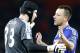 Chelsea's John Terry, right goes hug his former teammate and now Arsenal goalkeeper Petr Cech after the end of the English Premier League soccer match between Arsenal and Chelsea at the Emirates stadium in London, Sunday, Jan. 24, 2016.Chelsea won the game 1-0. (AP Photo/Frank Augstein)