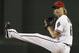 Arizona Diamondbacks' Bronson Arroyo winds up to throw a warmup pitch prior to the first inning of a baseball game against the Houston Astros on Tuesday, June 10, 2014, in Phoenix. (AP Photo/Ross D. Franklin)
