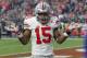 Ohio State running back Ezekiel Elliott (15) gestures as he celebrates his fourth touchdown of the game against Notre Dame during the second half of the Fiesta Bowl NCAA College football game, Friday, Jan. 1, 2016, in Glendale, Ariz. (AP Photo/Ross D. Franklin)