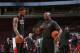 CHICAGO, IL - JANUARY 25: Udonis Haslem #40 and assistant coach Keith Smart of the Miami Heat before the game against the Chicago Bulls on January 25, 2015 at the United Center in Chicago, Illinois. NOTE TO USER: User expressly acknowledges and agrees that, by downloading and or using this Photograph, user is consenting to the terms and conditions of the Getty Images License Agreement. Mandatory Copyright Notice: Copyright 2015 NBAE (Photo by Gary Dineen/NBAE via Getty Images)