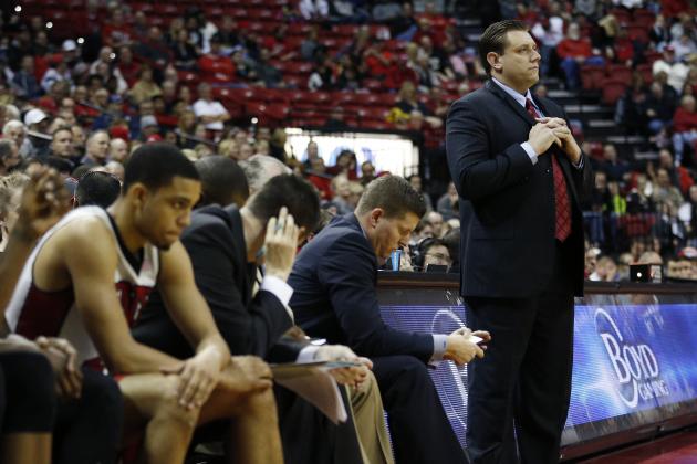 UNLV interim head coach Todd Simon, right, coaches against Air Force during the second half of an NCAA college basketball game Saturday, Jan. 16, 2016, in Las Vegas. UNLV won 100-64. (AP Photo/John Locher)