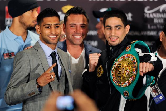 LAS VEGAS, NV - JULY 12:  (L-R) Strength and conditioning coach Ruben Tabares, boxer Amir Khan, President of Golden Boy Promotions Oscar De La Hoya, and boxer Danny Garcia pose during the final news conference at the Mandalay Bay Resort & Casino on July 12, 2012 in Las Vegas, Nevada. The two fighters will battle for the WBC super lightweight world championship on July 14 in Las Vegas.  (Photo by David Becker/Getty Images)