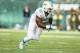 EAST RUTHERFORD, NJ - DECEMBER 01: Dion Jordan #95 of the Miami Dolphins in action against the New York Jets during their game at MetLife Stadium on December 1, 2013 in East Rutherford, New Jersey. (Photo by Al Bello/Getty Images)