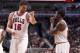 Chicago Bulls center Pau Gasol coaches guard Aaron Brooks during the second half of an NBA basketball game against the Miami Heat Monday, Jan. 25, 2016, in Chicago. The Heat won 89-84. (AP Photo/Charles Rex Arbogast)