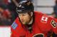 CALGARY, AB - OCTOBER 13: Dennis Wideman #6 of the Calgary Flames skates against the St Louis Blues at Scotiabank Saddledome on October 13, 2015 in Calgary, Alberta, Canada. (Photo by Derek Leung/Getty Images)
