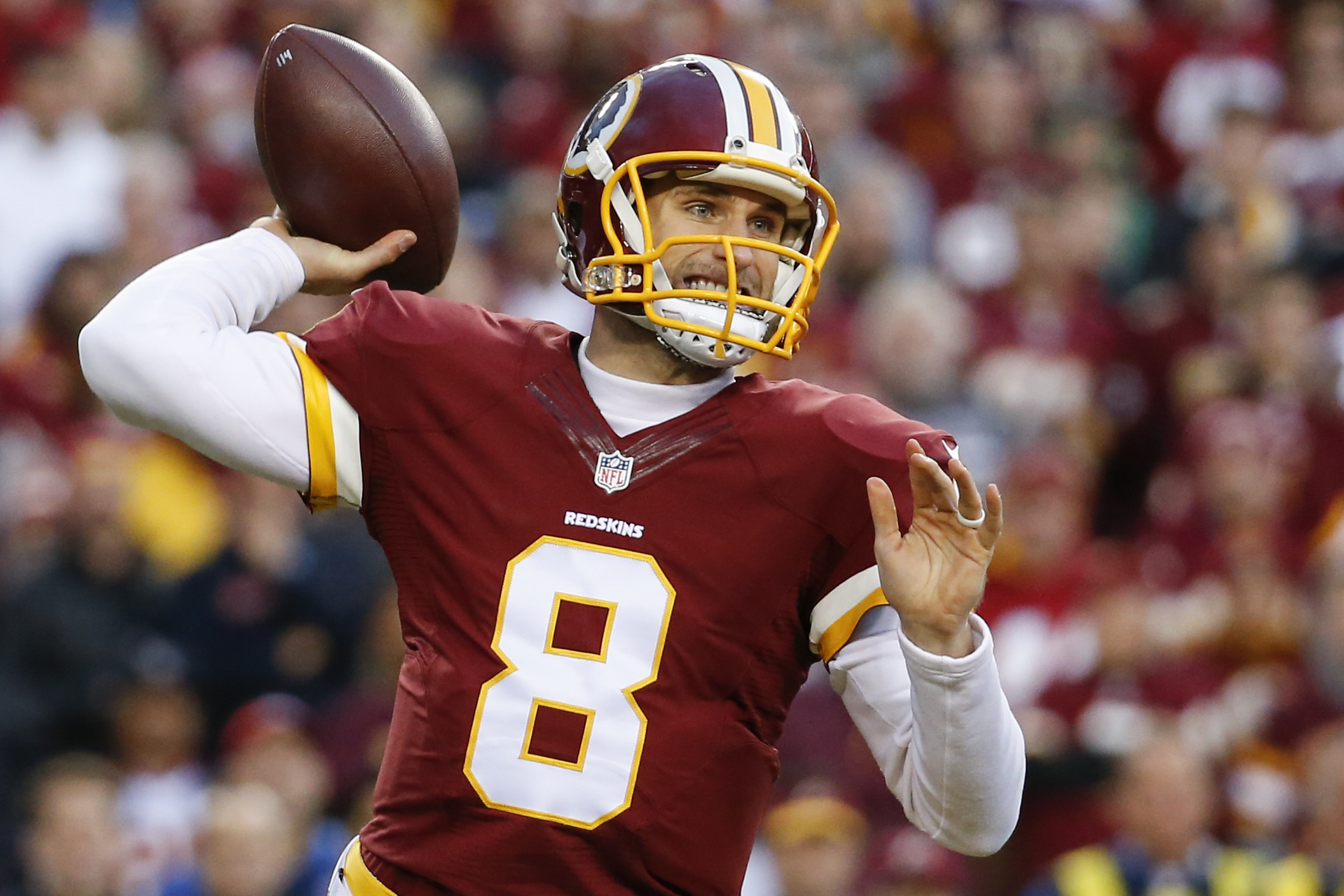 Washington Redskins quarterback Kirk Cousins throws to a receiver in the  first half of a preseason NFL football game against the Cincinnati Bengals,  Sunday, Aug. 27, 2017, in Landover, Md. (AP Pho …