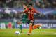 VIENNA, AUSTRIA - AUGUST 19: Louis Schaub of Vienna (L) competes for the ball with Alex Teixeira of Donetsk during the UEFA Champions League: Qualifying Round Play Off First Leg match between SK Rapid Vienna and FC Shakhtar Donetsk on August 19, 2015 in Vienna, Austria. (Photo by Christian Hofer/Getty Images)