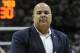 FILE - In this Dec. 5, 2015, file photo, UConn Athletic Director Warde Manuel is shown during a basketball game betweemn UConn and Notre Dame in Storrs, Conn. Two high ranking UConn officials say the school's athletic director has been offered the same job at Michigan. The officials spoke to The Associated Press on condition of anonymity Wednesday, Jan. 27, 2016, because Michigan has made no official announcements about the opening. (AP Photo/Jessica Hill, File)