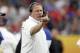 Notre Dame head coach Brian Kelly makes a call during the first half of the Fiesta Bowl NCAA College football game against Ohio State , Friday, Jan. 1, 2016, in Glendale, Ariz. (AP Photo/Ross D. Franklin)