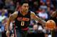 Jan 25, 2016; Denver, CO, USA; Atlanta Hawks guard Jeff Teague (0) dribbles the ball up court in the second quarter against the Denver Nuggets at the Pepsi Center. Mandatory Credit: Isaiah J. Downing-USA TODAY Sports