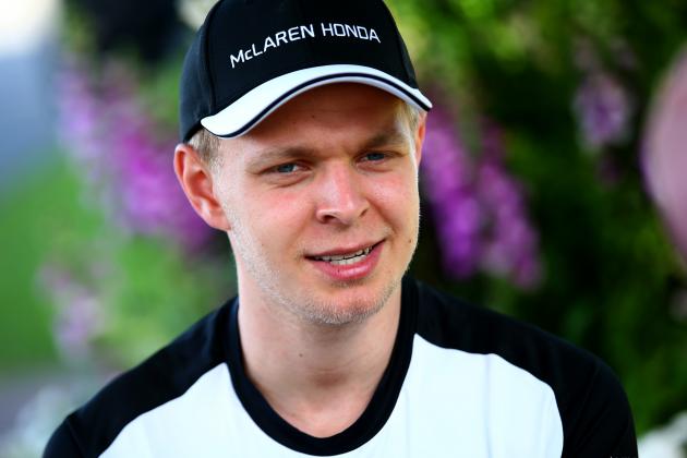 MELBOURNE, AUSTRALIA - MARCH 12: Kevin Magnussen of Denmark and McLaren Honda speaks with members of the media in the paddock during previews to the Australian Formula One Grand Prix at Albert Park on March 12, 2015 in Melbourne, Australia. (Photo by Mark Thompson/Getty Images)