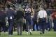 Houston Texans defensive end J.J. Watt (99) is helped off the field after he was injured during the second half of an NFL wild-card playoff football game against the Kansas City Chiefs, Saturday, Jan. 9, 2016, in Houston. (AP Photo/Tony Gutierrez)