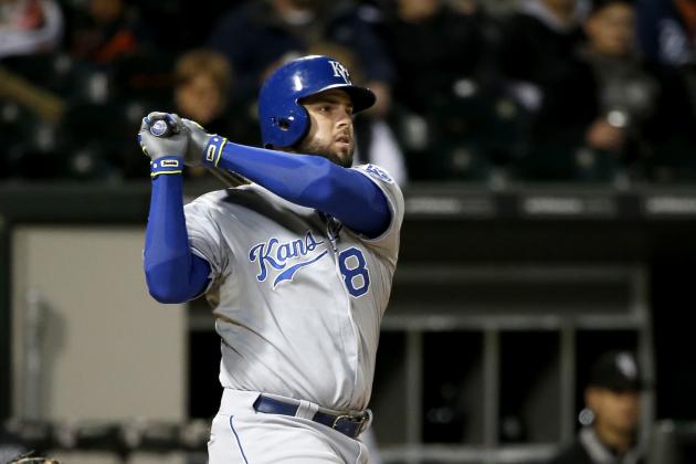 Kansas City Royals' Mike Moustakas watches his two-run home run off Chicago White Sox starting pitcher Jose Quintana, also scoring Kendrys Morales, during the sixth inning of a baseball game Wednesday, Sept. 30, 2015, in Chicago. (AP Photo/Charles Rex Arbogast)