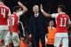 Arsenal's French manager Arsene Wenger (C) watches as Arsenal's German midfielder Mesut Ozil (R) celebrates scoring his team's second goal with teamamte Arsenal's Spanish defender Nacho Monreal during the UEFA Champions League football match between Arsenal and Bayern Munich at the Emirates Stadium in London, on October 20, 2015. Arsenal won the match 2-0. AFP PHOTO / BEN STANSALL (Photo credit should read BEN STANSALL/AFP/Getty Images)