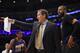 Phoenix Suns head coach Jeff Hornacek, center, directs his team as Phoenix Suns guard Brandon Knight, left, and center Tyson Chandler stand in the background during the first half of an NBA basketball game, Sunday, Jan. 3, 2016, in Los Angeles. (AP Photo/Mark J. Terrill)