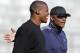 NFL draft prospect Cam Newton shares a laugh with former NFL quarterback Warren Moon, right, during a football workout Thursday, Feb. 10, 2011, in San Diego. (AP Photo/Chris Park)