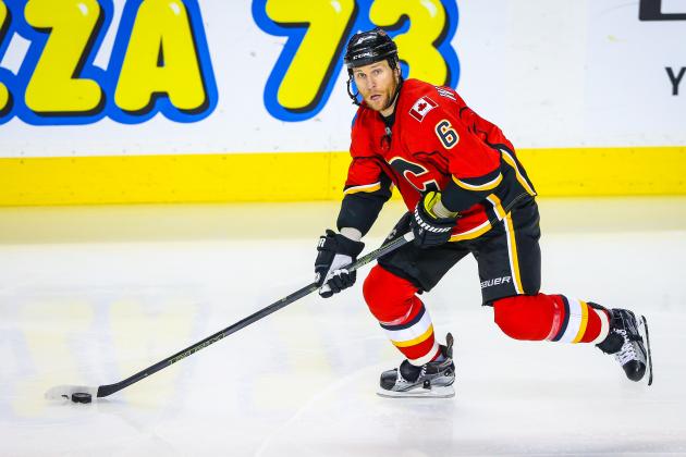 Jan 7, 2016; Calgary, Alberta, CAN; Calgary Flames defenseman Dennis Wideman (6) skates with the puck against the Arizona Coyotes during the third period at Scotiabank Saddledome. Arizona Coyotes won 2-1. Mandatory Credit: Sergei Belski-USA TODAY Sports