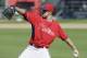 Philadelphia Phillies pitcher Jesse Biddle throws during spring training baseball practice Sunday, Feb. 16, 2014, in Clearwater, Fla. (AP Photo/Charlie Neibergall)