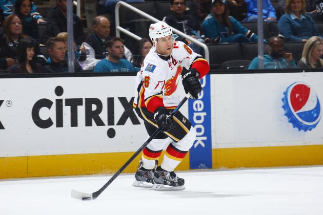 SAN JOSE, CA - NOVEMBER 28: Dennis Wideman #6 of the Calgary Flames skates with control of the puck against the San Jose Sharks at SAP Center on November 28, 2015 in San Jose, California. (Photo by Rocky W. Widner/NHL/Getty Images)