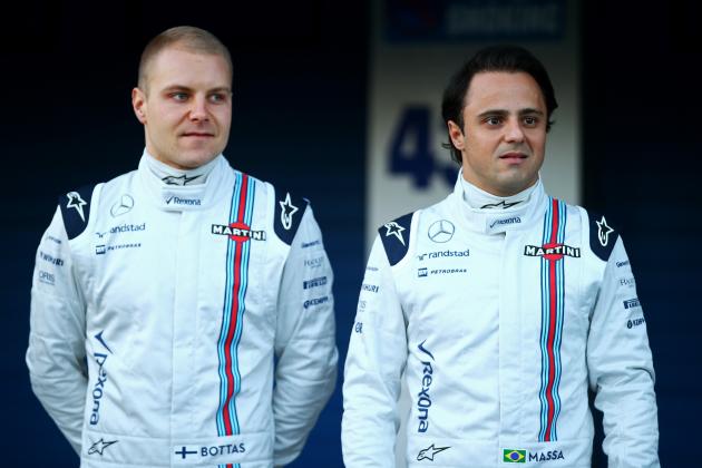 JEREZ DE LA FRONTERA, SPAIN - FEBRUARY 01: Felipe Massa of Brazil and Williams and Valtteri Bottas of Finland and Williams pose with the new FW37 outside the garage during day one of Formula One Winter Testing at Circuito de Jerez on February 1, 2015 in Jerez de la Frontera, Spain. (Photo by Mark Thompson/Getty Images)