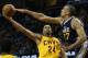 Cleveland Cavaliers forward Richard Jefferson (24) tries to shoot against Utah Jazz center Rudy Gobert during the first half of an NBA basketball game Tuesday, Nov. 10, 2015, in Cleveland. (AP Photo/Ron Schwane)