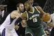 Milwaukee Bucks center Greg Monroe, right, goes to the basket against Sacramento Kings center Kosta Koufos during the second half of an NBA basketball game Monday, Feb. 1, 2016, in Sacramento, Calif. The Kings won 111-104. (AP Photo/Rich Pedroncelli)