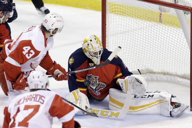 Florida Panthers goalie Roberto Luongo (1) blocks a shot by Detroit Red Wings center Darren Helm (43) during the first period of an NHL hockey game, Thursday, Feb. 4, 2016, Sunrise, Fla. The Panthers won 6-3. (AP Photo/Alan Diaz)