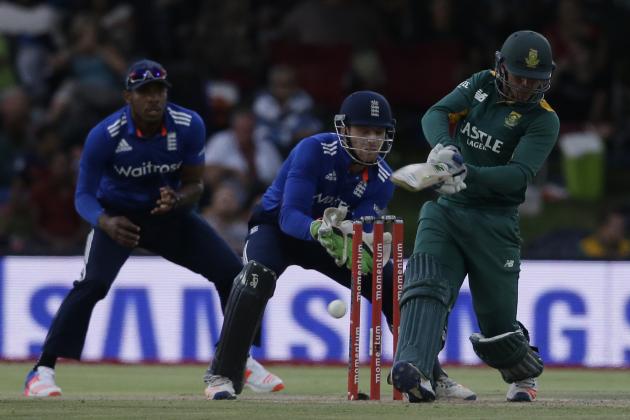 South Africa’s batsman Quinton de Kock, right, plays a shot as England’s wicketkeeper Jos Buttler, middle, with teammate Chris Jordan, left, watches during the 1st One-Day Internationals cricket match between South Africa and England, at the Mangaung Oval in Bloemfontein, South Africa, Wednesday, Feb. 3, 2016. (AP Photo/Themba Hadebe)