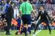 Barcelona's coach Luis Enrique (R) shouts after a fault was committed on Barcelona's Argentinian forward Lionel Messi (down) during the Spanish league football match FC Barcelona vs Club Atletico de Madrid at the Camp Nou stadium in Barcelona on January 30, 2016. AFP PHOTO/ PAU BARRENA / AFP / PAU BARRENA (Photo credit should read PAU BARRENA/AFP/Getty Images)
