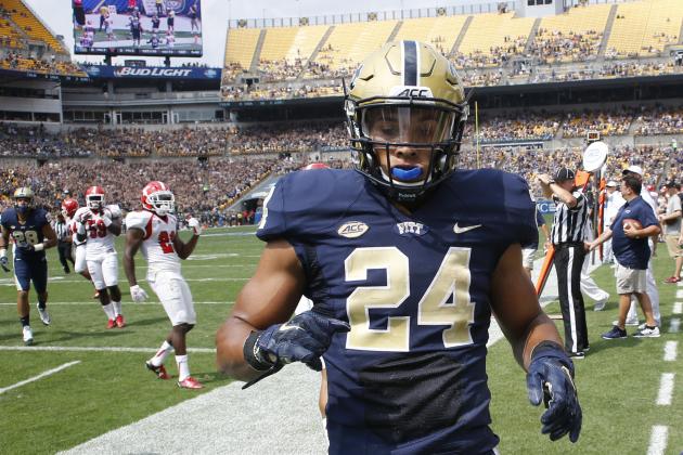 Pittsburgh running back James Conner (24) runs in for a touchdown in an NCAA football game between the Pittsburgh and Youngstown State, Saturday, Sept. 5, 2015 in Pittsburgh. (AP Photo/Keith Srakocic)