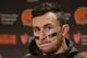 Cleveland Browns quarterback Johnny Manziel speaks with media members following the team's 30-13 loss to the Seattle Seahawks n an NFL football game, Sunday, Dec. 20, 2015, in Seattle. (AP Photo/Scott Eklund)