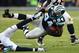 Kony Ealy (#94) of the Carolina Panthers tumbles with the ball during Super Bowl 50 against the Denver Broncos at Levi's Stadium in Santa Clara, California February 7, 2016. / AFP / TIMOTHY A. CLARY (Photo credit should read TIMOTHY A. CLARY/AFP/Getty Images)