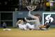 New York Mets shortstop Ruben Tejada, right, lands next to Los Angeles Dodgers' Chase Utley who broke up a double play during the seventh inning in Game 2 of baseball's National League Division Series, Saturday, Oct. 10, 2015 in Los Angeles. (AP Photo/Gregory Bull)