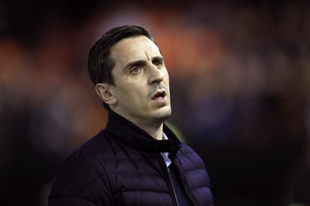FILE - In this Sunday, Jan. 3, 2016 file photo, Valencia's head coach Gary Neville arrives for a Spanish La Liga soccer match against Real Madrid at the Mestalla stadium in Valencia, Spain. Gary Neville knew that coaching at a high level wasn’t going to be easy. He certainly didn’t expect to be struggling so badly so early. Less than two months into his first head-coaching job, the former England great is already in danger of being fired. Publicly, the club is backing up Neville despite the disappointing results and the increased pressure from supporters unsatisfied with the coach.