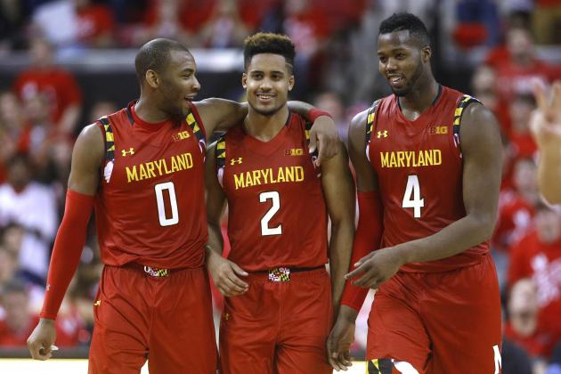 Maryland guard Rasheed Sulaimon, guard Melo Trimble and forward Robert Carter, from left, celebrate in the final moments of the team's NCAA college basketball game against Purdue, Saturday, Feb. 6, 2016, in College Park, Md. The three contributed a combined 54 points to Maryland's 72-61 win. (AP Photo/Patrick Semansky)