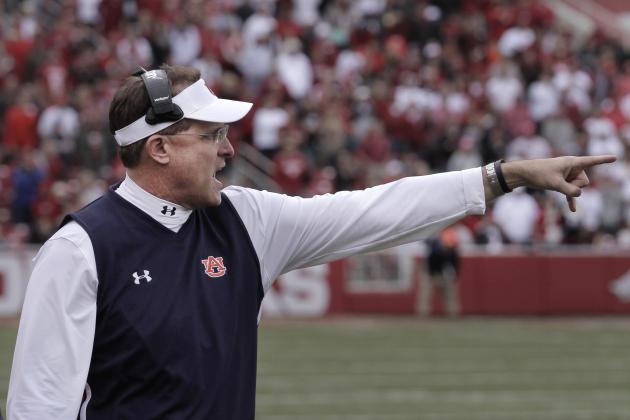 Auburn's Gus Malzahn yells to players from the sideline during overtime of an NCAA college football game against Arkansas, Saturday, Oct. 24, 2015, in Fayetteville, Ark. Arkansas won 54-46 in four overtimes. (AP Photo/Samantha Baker)