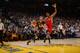 OAKLAND, CA - FEBRUARY 9: Stephen Curry #30 of the Golden State Warriors drives against Trevor Ariza #1 of the Houston Rockets on February 9, 2016 at Oracle Arena in Oakland, California. NOTE TO USER: User expressly acknowledges and agrees that, by downloading and or using this photograph, user is consenting to the terms and conditions of Getty Images License Agreement. Mandatory Copyright Notice: Copyright 2016 NBAE (Photo by Noah Graham/NBAE via Getty Images)