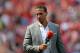 Former Manchester United defender Rio Ferdinand, working as a Television pundit is pictured ahead of the English Premier League football match between Manchester United and Tottenham Hotspur at Old Trafford in Manchester, north west England, on August 8, 2015. AFP PHOTO / OLI SCARFF
RESTRICTED TO EDITORIAL USE. No use with unauthorized audio, video, data, fixture lists, club/league logos or 'live' services. Online in-match use limited to 75 images, no video emulation. No use in betting, games or single club/league/player publications. (Photo credit should read OLI SCARFF/AFP/Getty Images)