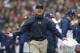 Michigan head coach Jim Harbaugh reacts after a play in the first half of an NCAA college football game against Maryland, Saturday, Oct. 3, 2015, in College Park, Md. (AP Photo/Patrick Semansky)