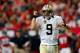 ATLANTA, GA - JANUARY 03: Drew Brees #9 of the New Orleans Saints celebrates a touchdown during the first half against the Atlanta Falcons at the Georgia Dome on January 3, 2016 in Atlanta, Georgia. (Photo by Kevin C. Cox/Getty Images)