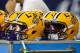LSU helmets sit on the bench area during the Texas Bowl NCAA football game Tuesday, Dec. 29, 2015, in Houston. LSU won 56-27. (AP Photo/Bob Levey)
