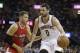 Cleveland Cavaliers' Kevin Love (0) drives past Los Angeles Clippers’ Blake Griffin (32) during an NBA basketball game Thursday, Feb. 5, 2015, in Cleveland. (AP Photo/Tony Dejak)