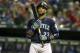 Seattle Mariners Robinson Cano prepares to bat during a baseball game against the Texas Rangers in Arlington, Texas, Friday, Sept. 18, 2015. (AP Photo/LM Otero)