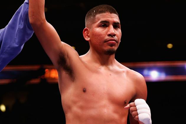 GLENDALE, AZ - OCTOBER 14:  Alexis Santiago celebrates his win by unanimous decision over Gusavo Molina (not pictured) during their super bantamweight bout at Gila River Arena on October 14, 2015 in Glendale, Arizona.  (Photo by Christian Petersen/Getty Images)