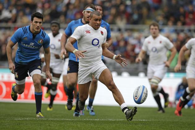England’s Jonathan Joseph races clear to score his second try during the Six Nations rugby union match between Italy and England, in Rome's Olympic stadium, Sunday, Feb. 14, 2016. (AP Photo/Andrew Medichini)