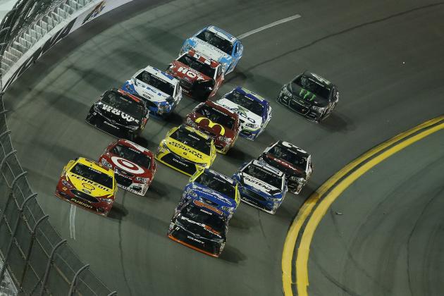 DAYTONA BEACH, FL - FEBRUARY 13:  Denny Hamlin, driver of the #11 FedEx Express Toyota, and Joey Logano, driver of the #22 Shell Pennzoil Ford, lead a pack of cars during the NASCAR Sprint Cup Series Sprint Unlimited at Daytona International Speedway on February 13, 2016 in Daytona Beach, Florida.  (Photo by Matt Sullivan/Getty Images)