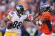 Pittsburgh Steelers wide receiver Darrius Heyward-Bey, left, pushes off Denver Broncos free safety Bradley Roby during the first half in an NFL football divisional playoff game, Sunday, Jan. 17, 2016, in Denver. (AP Photo/David Zalubowski)