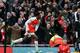 Danny Welbeck wheels away in celebration after scoring a last-gasp winner for Arsenal against Leicester City.